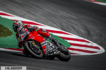 side profile, red on a race track