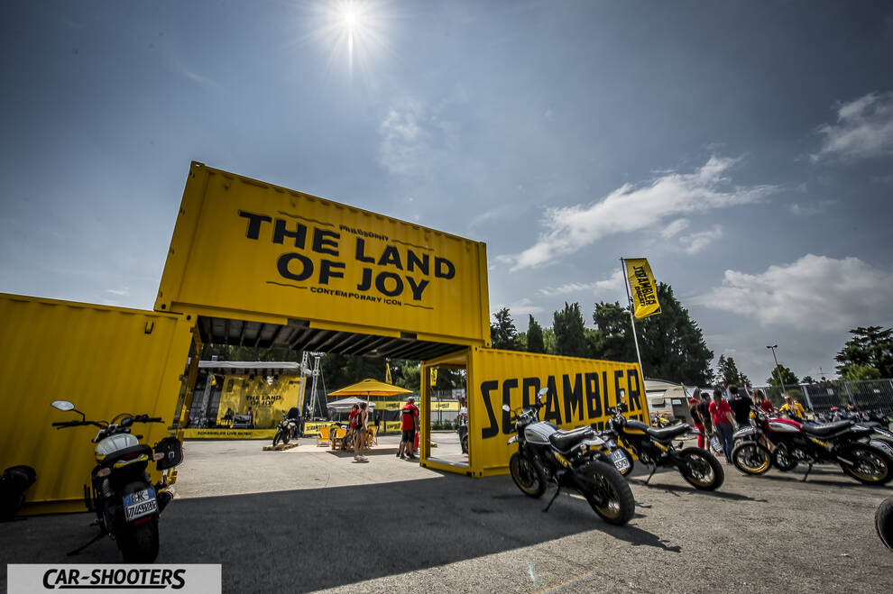 detail, outdoor event with yellow shipping containers