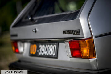 rear view, silver with a vintage license plate