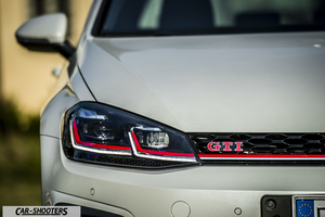 detail, headlight and grille close-up