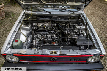 engine bay, open hood showing engine components