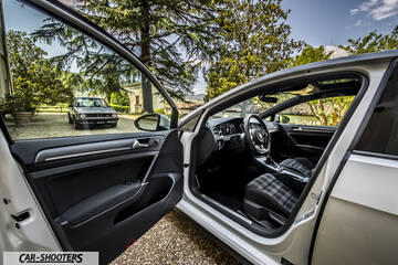 interior, plaid front seats and open door