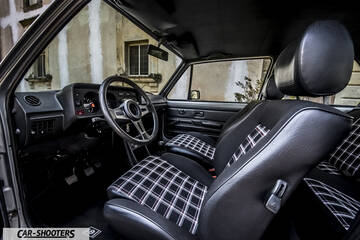 interior, plaid cloth inserts on front seats