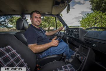 interior, plaid front seats and driver