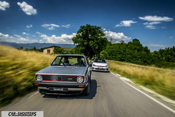front three-quarter, silver on a country road