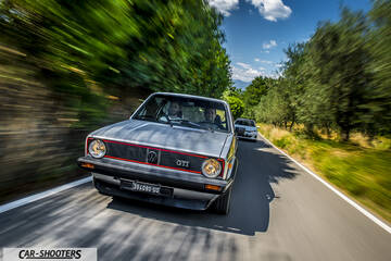 front three-quarter, silver on a country road