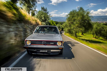 front three-quarter, silver on a country road
