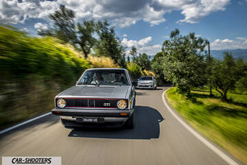 front three-quarter, silver on a country road