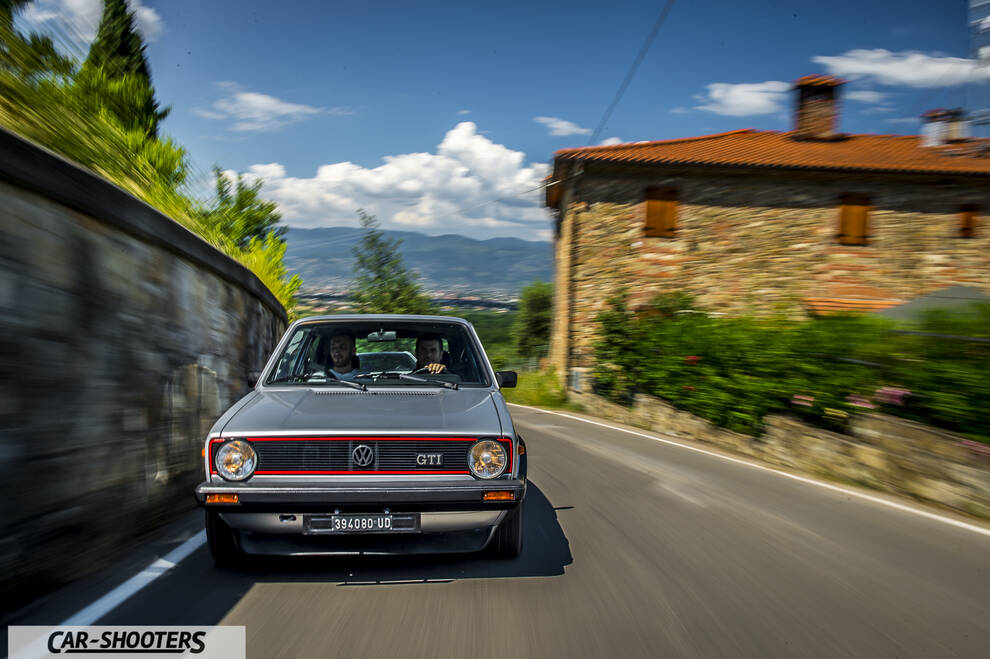 front three-quarter, silver on a country road