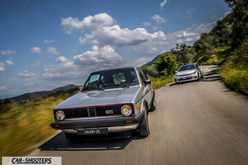 front three-quarter, silver on a country road