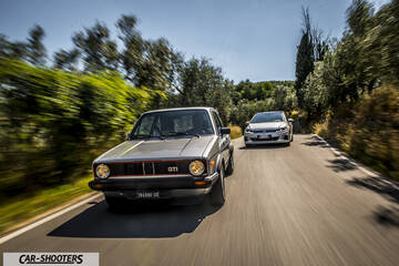 front three-quarter, silver on a country road