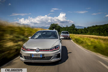 front three-quarter, silver on a country road
