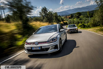 front three-quarter, silver on a country road