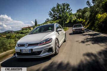 front three-quarter, silver on a country road