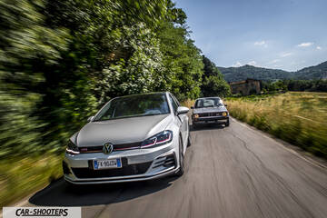 front three-quarter, silver on a country road