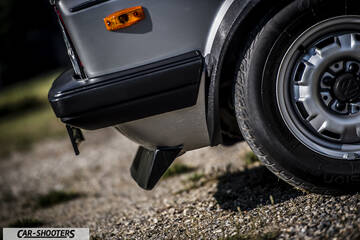 detail, front wheel and bumper close-up