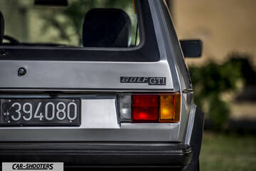 rear view, silver metallic with visible license plate