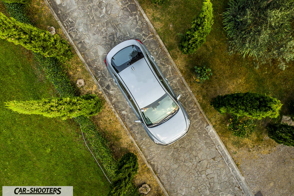 Hyundai Ioniq – detail, viewed from above on a stone driveway