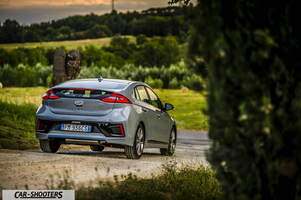 Hyundai Ioniq – rear three-quarter, silver on a country road