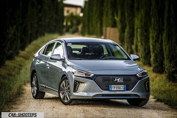 Hyundai Ioniq – front three-quarter, silver on a country road