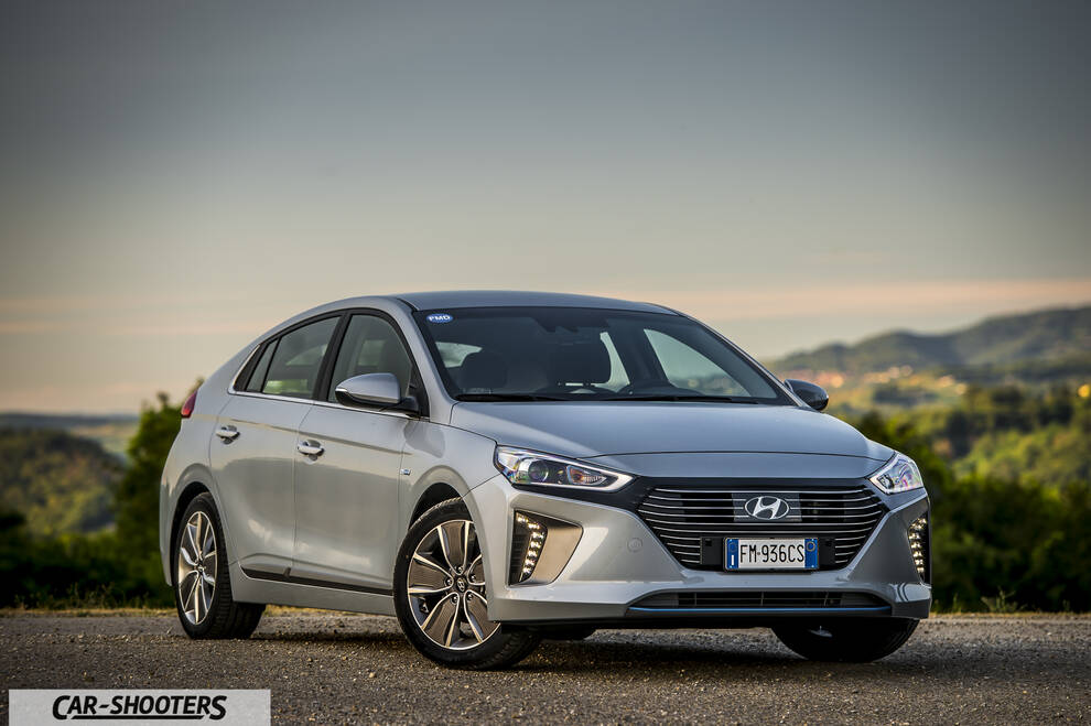 Hyundai Ioniq – front three-quarter, silver metallic against a mountain backdrop