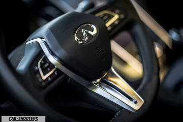 Infiniti Q60 – interior, leather steering wheel close-up