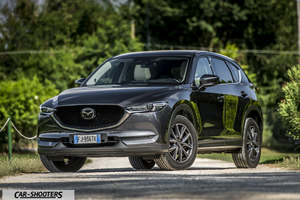 Mazda CX 5 – front three-quarter, grey metallic on a country road