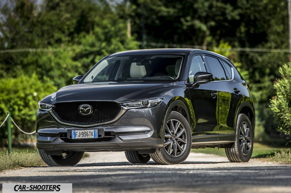 Mazda CX 5 – front three-quarter, grey metallic on a country road
