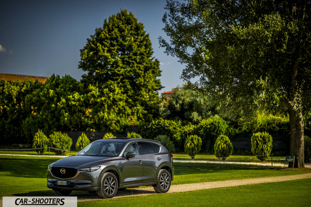 Mazda CX 5 – front three-quarter, grey metallic on a country road