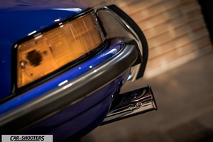 Porsche – detail, headlight and bumper close-up