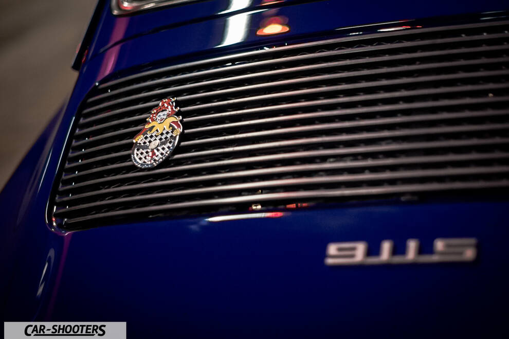 Porsche – detail, rear grille close-up with badge