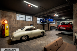 Porsche – rear three-quarter, off white in a classic garage
