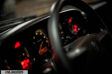 Porsche – dashboard, analog instrument cluster with red illumination