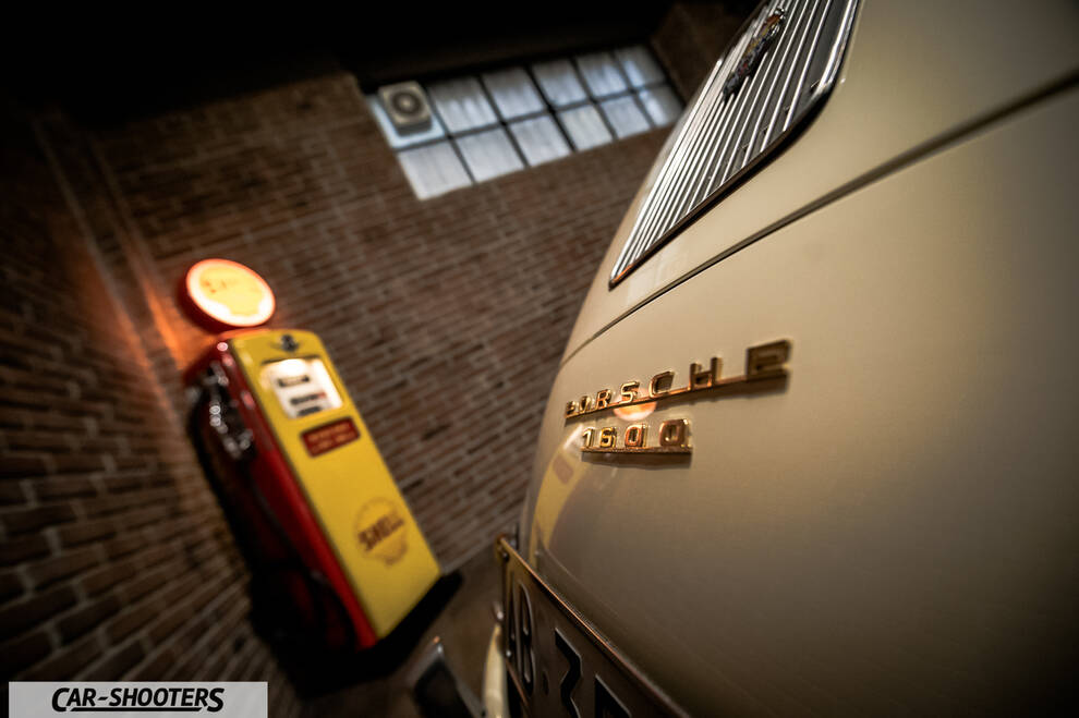 Porsche – rear view, cream in a vintage garage