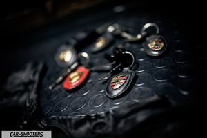 Porsche – detail, car keys on a mat