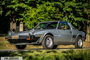 Fiat X1 9 Storia – front three-quarter, silver on a road surrounded by trees