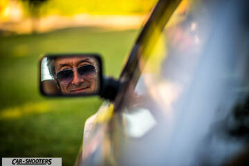 Fiat X1 9 Storia – detail, side mirror reflection of a driver