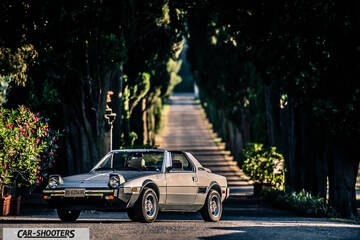 Fiat X1 9 Storia – front three-quarter, silver on a tree lined road