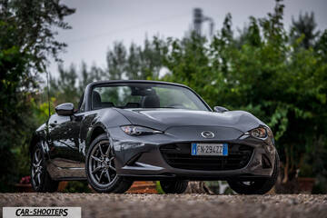 Mazda MX 5 Cherry Edition – front three-quarter, grey metallic on a gravel path