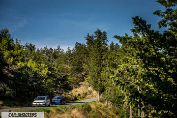 Volkswagen Golf R – front three-quarter, silver on a winding country road