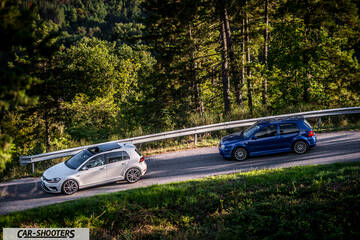 Volkswagen Golf R – front three-quarter, white on a winding country road