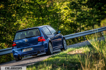 Volkswagen Golf R – rear three-quarter, blue on a country road