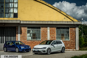 Volkswagen Golf R – front three-quarter, white against a rustic brick wall