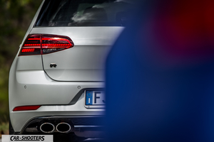 Volkswagen Golf R – rear view, silver partially obscured by foreground element