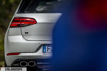 Volkswagen Golf R – rear view, silver partially obscured by foreground element