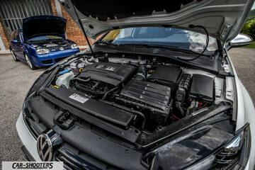 Volkswagen Golf R – engine bay, with another car in background