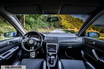 Volkswagen Golf R – dashboard, view from inside looking at a country road