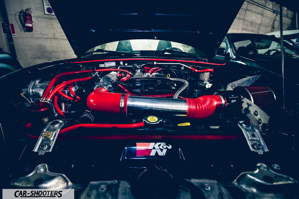 engine bay, modified engine bay with red hoses