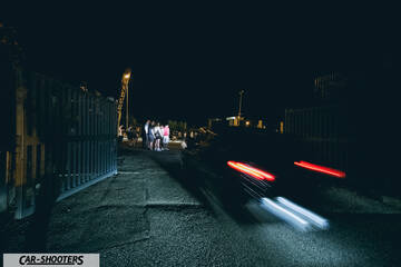 rear view, black driving at night