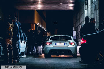 rear view, white in a dimly lit alley